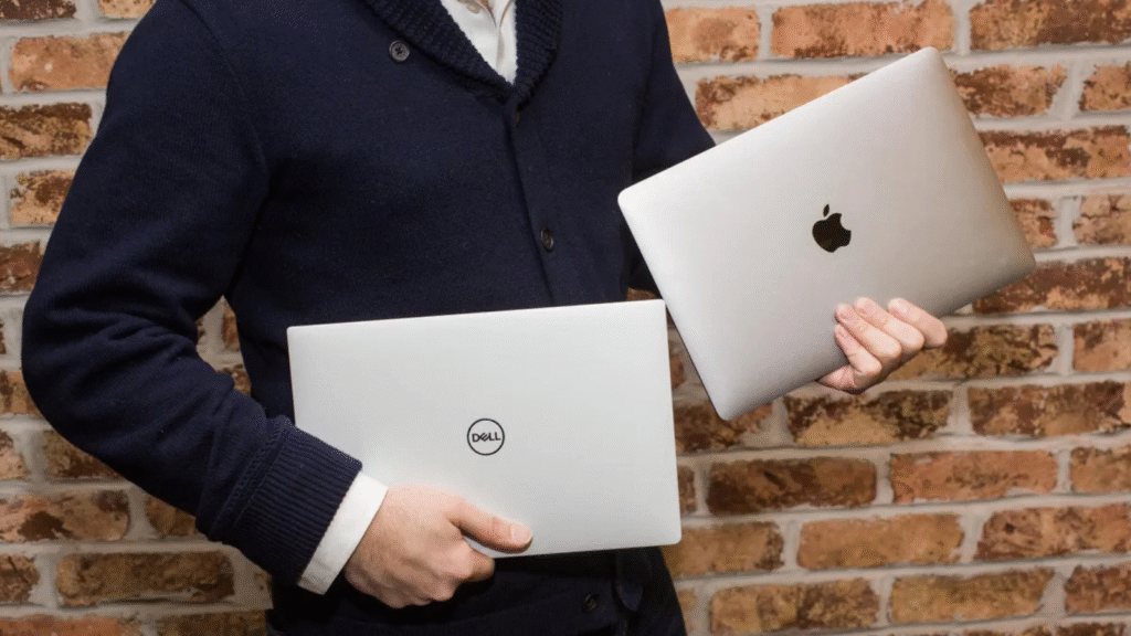 Perbandingan MacBook Air M3 dan Dell XPS 13 untuk freelancer kreatif dalam hal performa, portabilitas, layar, dan produktivitas kerja.