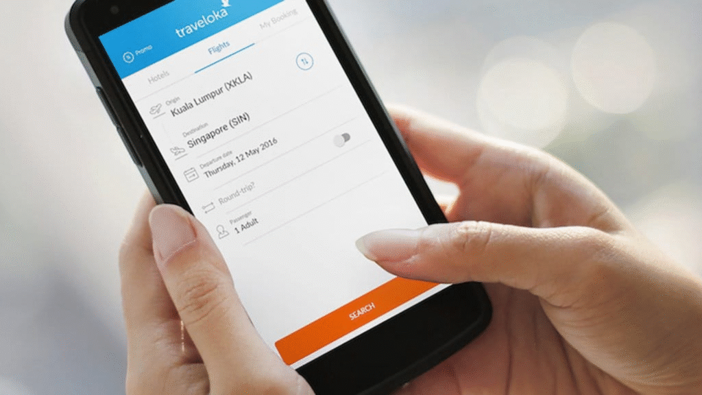 Pengguna Traveloka Xperience memesan tiket konser Coldplay secara online dengan proses mudah dan pembayaran aman